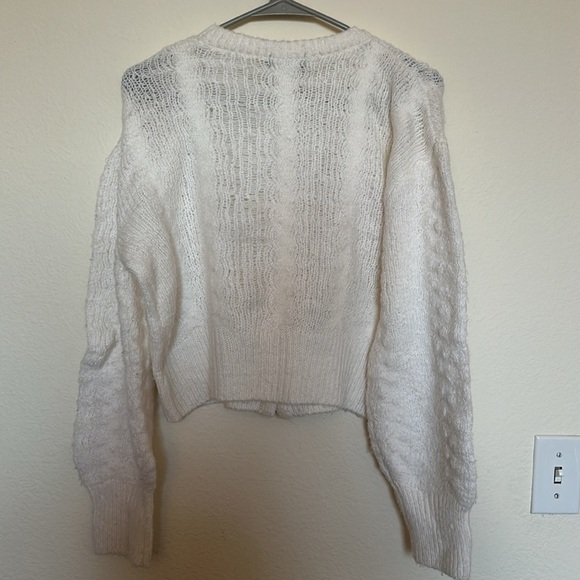 Cozy White Sweater with Black Floral Buttons - Picture 2 of 3